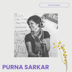 A square graphic with a light grey background and purple text that reads "meet the practitioner" at the top in an oval, and in bold letters reads "PURNA SARKAR" at the bottom left. In the center is a black and white image of Purna holding an object, smiling, as she teaches in front of a white board. In the corner there is a graphic of a dried yellow flower.