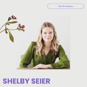  square graphic with a light grey background and purple text that reads "meet the practitioner" at the top in an oval, and in bold letters reads "SHELBY SEIER" at the bottom left. In the center is an image of Shelby, who has blond hair and is wearing a green shirt. Next to her is a graphic of a dried flower that has small pinkish red buds.